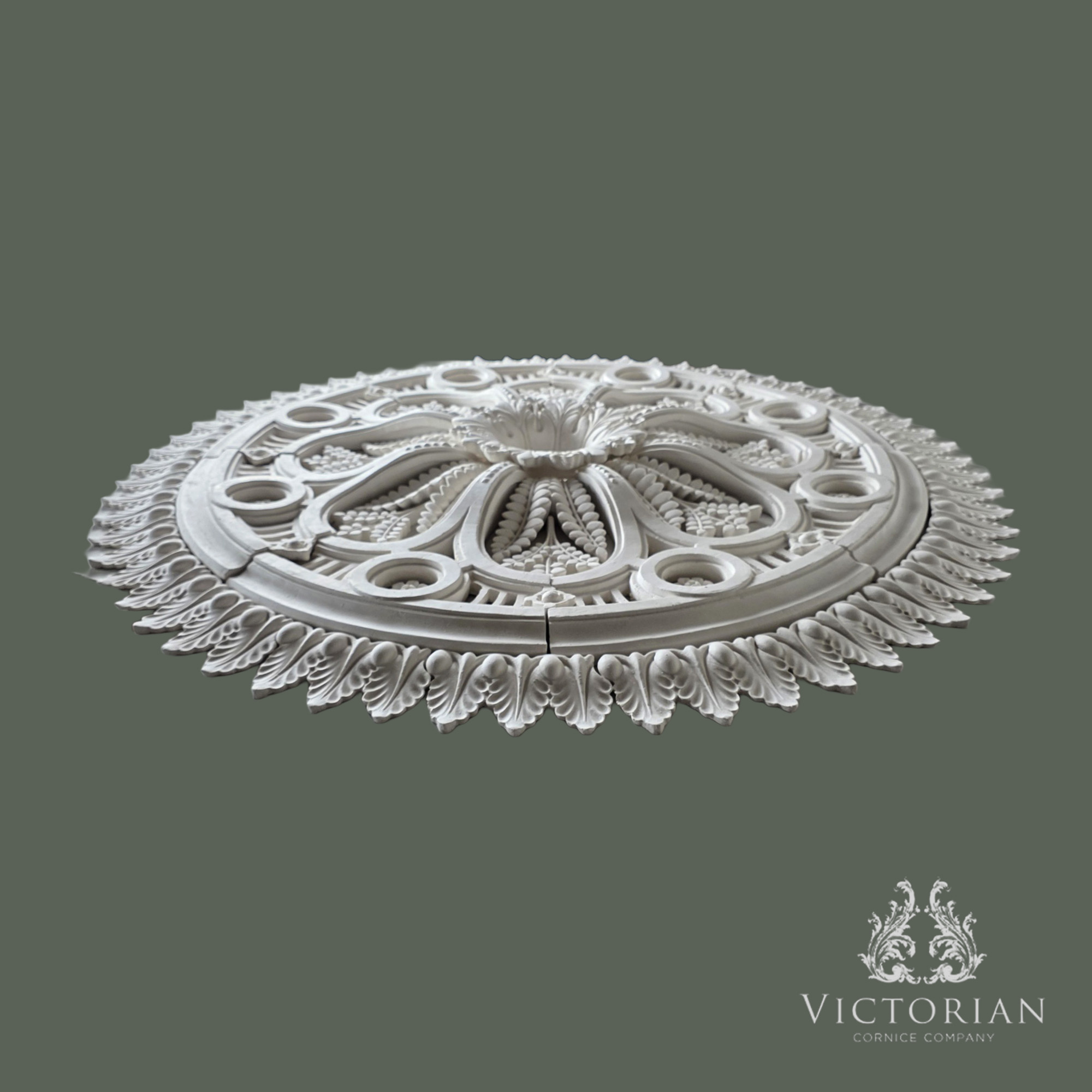 Side profile of the R20 handmade multi-piece plaster ceiling rose showing its deep layered profile and pierced detailing.