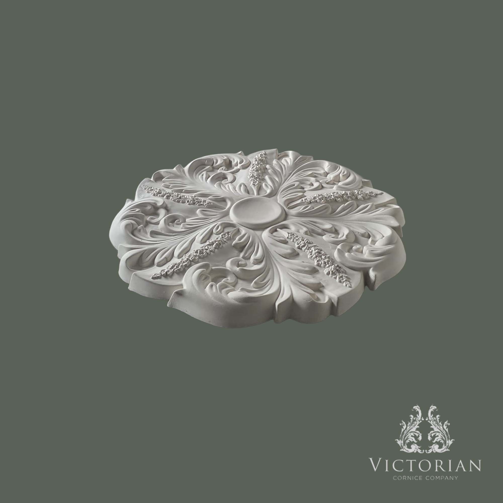 Side profile of the R21 handmade plaster ceiling rose showing its sculpted depth and decorative raised detailing.