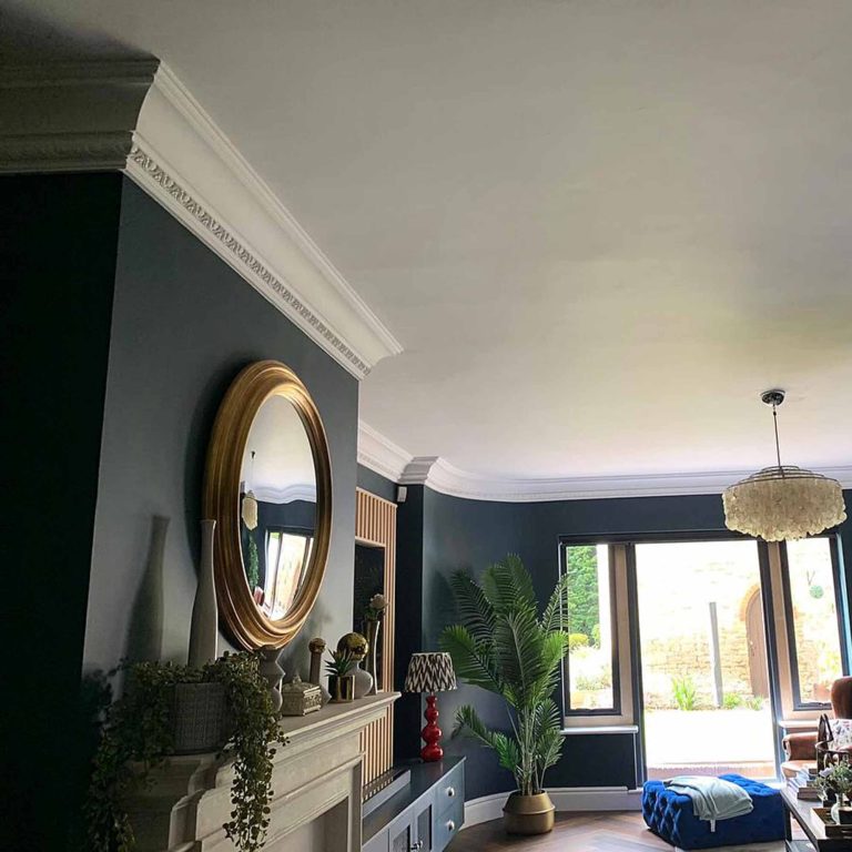 Edwardian-style living room with traditional plaster coving and period features