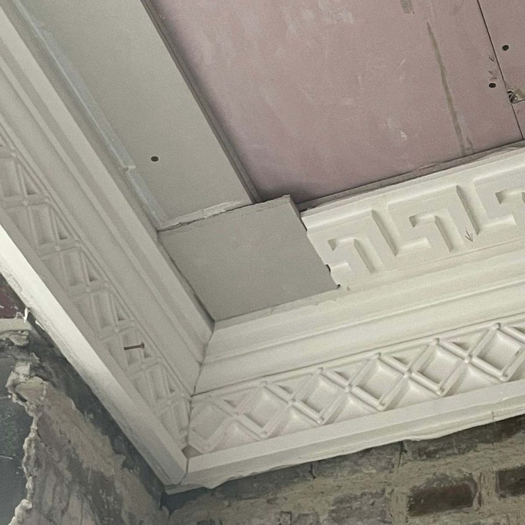 Decorative plaster cornice being installed at Worswick Chambers in Newcastle